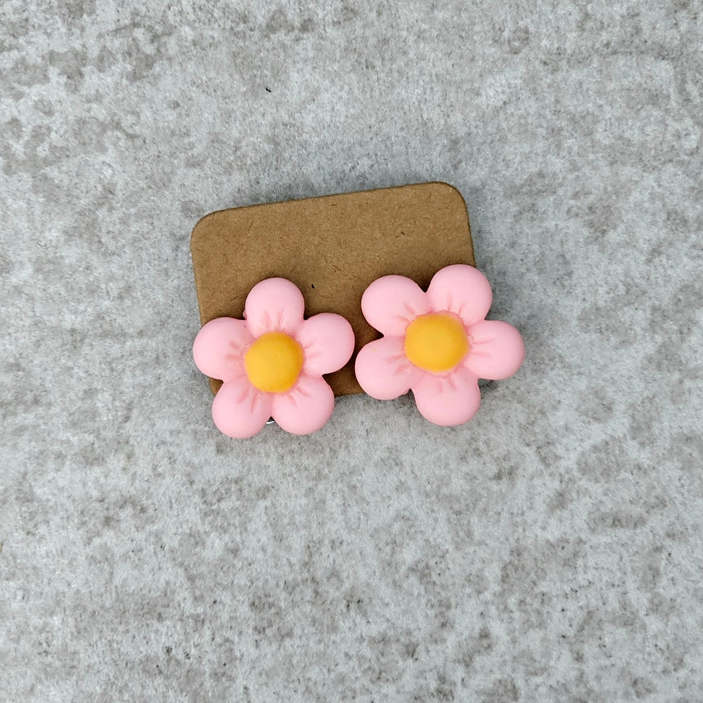 Pink flower clip on earrings