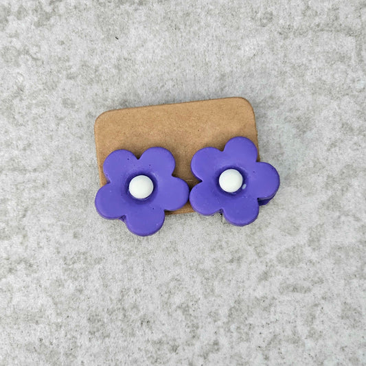 Purple flower clip on earrings